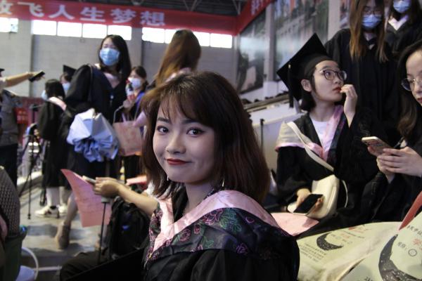 Bamo Anyu graduating from Southwest Minzu University in 2020