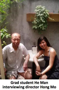 Grad student He Man interviewing director Hong Mo